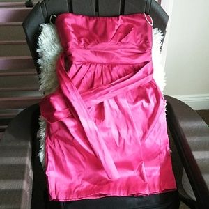 Pink body fitting dress with belt